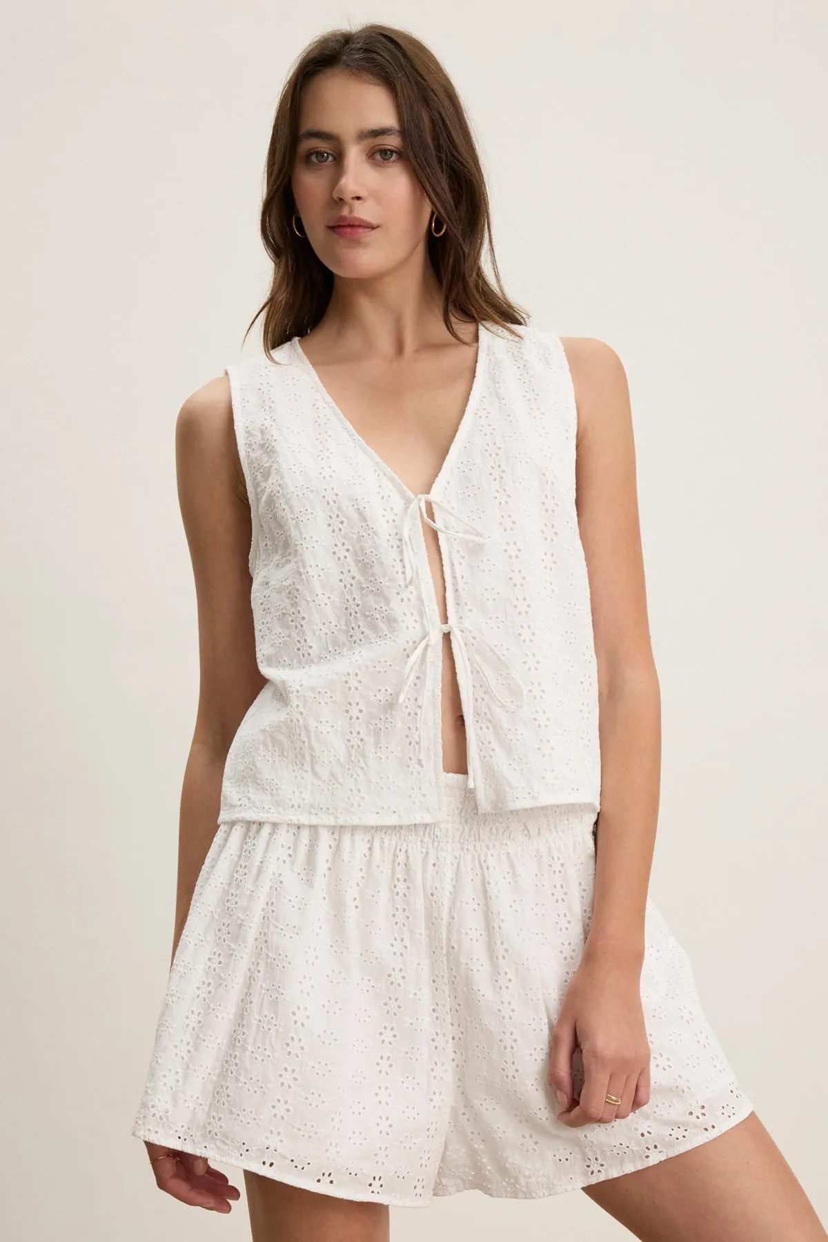 Asymmetrical Cut Sporty Style AVA EYELET TOP